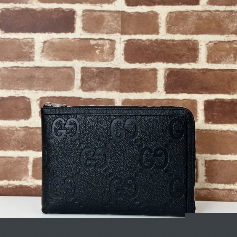 G*u*i clutch bags